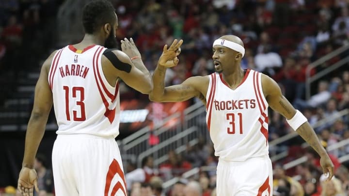 Mar 25, 2016; Houston, TX, USA; Houston Rockets guard James Harden (13) celebrates with guard Jason Terry (31) after a play against the Toronto Raptors in the second half at Toyota Center. The Rockets won 112-109. Mandatory Credit: Thomas B. Shea-USA TODAY Sports
