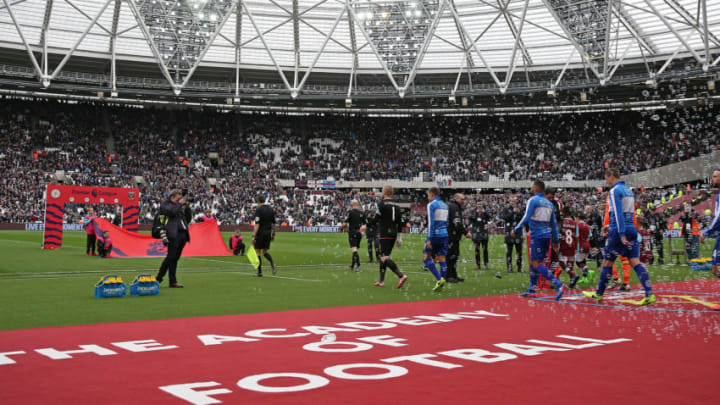 March 18th 2017, The London Stadium, East London, England; EPL Premier League football, West Ham versus Leicester City; Both teams enter the pitch from the tunnel before kick off (Photo by John Patrick Fletcher/Action Plus via Getty Images)