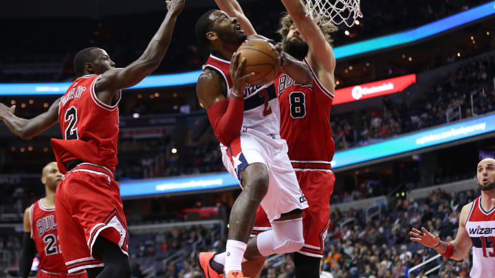 Jan 10, 2017; Washington, DC, USA; Washington Wizards guard John Wall (2) shoots the ball as Chicago Bulls center Robin Lopez (8) defends in the second quarter at Verizon Center. Mandatory Credit: Geoff Burke-USA TODAY Sports