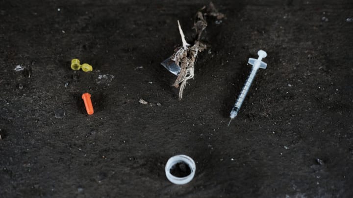 PHILADELPHIA, PA - JULY 31: Used needles are left behind in what was a heroin shooting gallery in the Kensington section of Philadelphia which has become a hub for heroin use on July 31, 2017 in Philadelphia, Pennsylvania. Today was the first day of a long anticipated clean-up of one of the largest open air drug markets on the East Coast. Hundreds of outreach workers, city employees and Conrail workers started to clear an area of heroin users from a stretch of train tracks in Philadelphia's Kensington section known as El Campamento. Over 900 people died last year in Philadelphia from opioid overdoses, a 30 percent increase from 2015. As the epidemic shows no signs of weakening, the number of fatalities this year is expected to surpass last year's numbers. Heroin use has doubled across the country since 2010, according to the DEA, part of an epidemic of opioid abuse that began in the 1990s, when doctors began prescribing higher doses of powerful painkillers. (Photo by Spencer Platt/Getty Images)