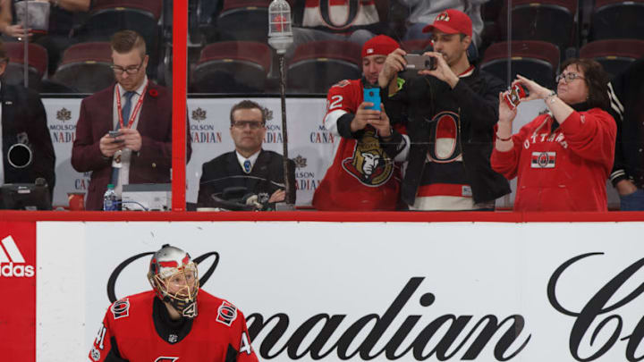 OTTAWA, ON - OCTOBER 30: Fans take pictures as Craig Anderson