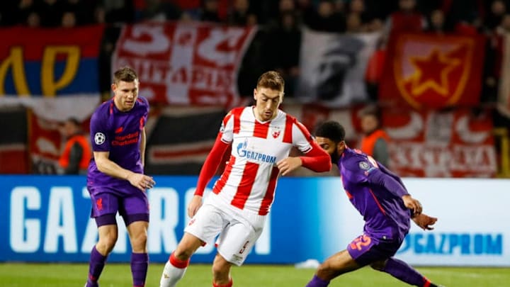 BELGRADE, SERBIA - NOVEMBER 06: Milan Pavkov (C) of Crvena Zvezda in action against Joel Matip (R) and James Milner (L) of Liverpool during the Group C match of the UEFA Champions League between Red Star Belgrade and Liverpool at Rajko Mitic Stadium on November 06, 2018 in Belgrade, Serbia. (Photo by Srdjan Stevanovic/Getty Images)