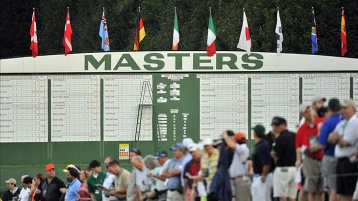 Apr 5, 2012; Augusta, GA, USA; A general view of the scoreboard as fans line up along the first hold before the start of the first round of the 2012 The Masters golf tournament at Augusta National Golf Club. Mandatory Credit: Jack Gruber-USA TODAY Sports