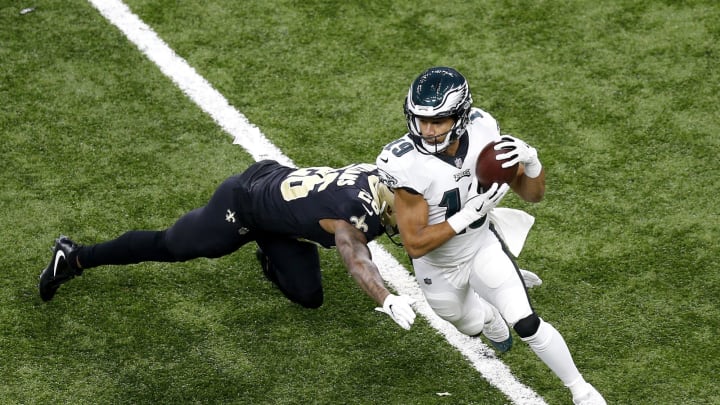 NEW ORLEANS, LOUISIANA – JANUARY 13: Golden Tate #19 of the Philadelphia Eagles avoids the tackle attempt of P.J. Williams #26 of the New Orleans Saints during the first quarter in the NFC Divisional Playoff Game at Mercedes Benz Superdome on January 13, 2019 in New Orleans, Louisiana. (Photo by Jonathan Bachman/Getty Images)