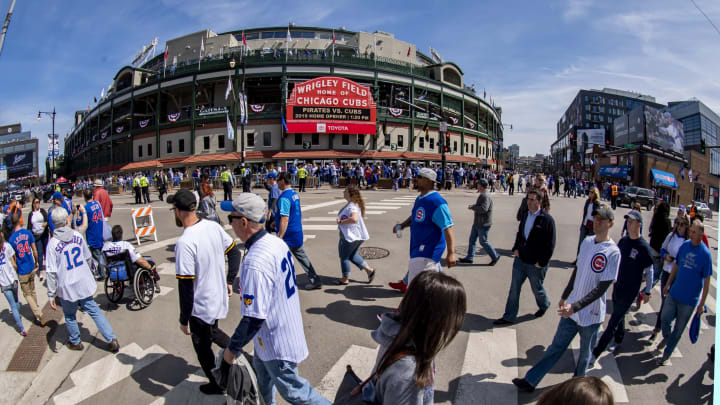 Apr 8, 2019; Chicago, IL, USA; The marquee and scenes outside Wrigley Field prior to a game between the Chicago Cubs and the Pittsburgh Pirates. Mandatory Credit: Patrick Gorski-USA TODAY Sports