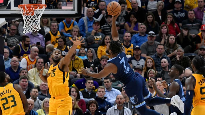 SALT LAKE CITY, UT – OCTOBER 22: Wayne Selden Jr. #7 of the Memphis Grizzlies goes to the basket against the defense of Derrick Favors #15 of the Utah Jazz in the second half of a NBA game at Vivint Smart Home Arena on October 22, 2018 in Salt Lake City, Utah. NOTE TO USER: User expressly acknowledges and agrees that, by downloading and or using this photograph, User is consenting to the terms and conditions of the Getty Images License Agreement. (Photo by Gene Sweeney Jr./Getty Images)