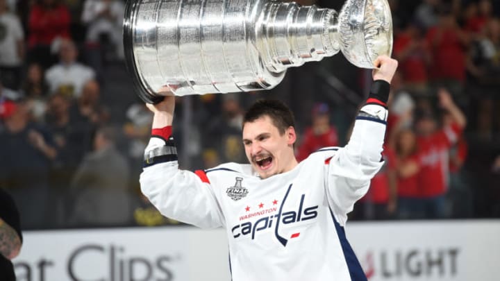 LAS VEGAS, NV - JUNE 07: Washington Capitals Defenseman Dmitry Orlov (9) hoists the Stanley Cup after defeating the Las Vegas Golden Knights 4-3 to win the Stanley Cup during game 5 of the Stanley Cup Final between the Washington Capitals and the Las Vegas Golden Knights on June 07, 2018 at T-Mobile Arena in Las Vegas, NV. (Photo by Chris Williams/Icon Sportswire via Getty Images)