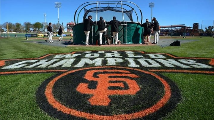 Mar 2, 2013; Scottsdale, AZ, USA; A detailed view of the logo and text celebrating the San Francisco Giants 2012 championship during batting practice at Scottsdale Stadium before a game against the Chicago Cubs. Mandatory Credit: Jake Roth-USA TODAY Sports