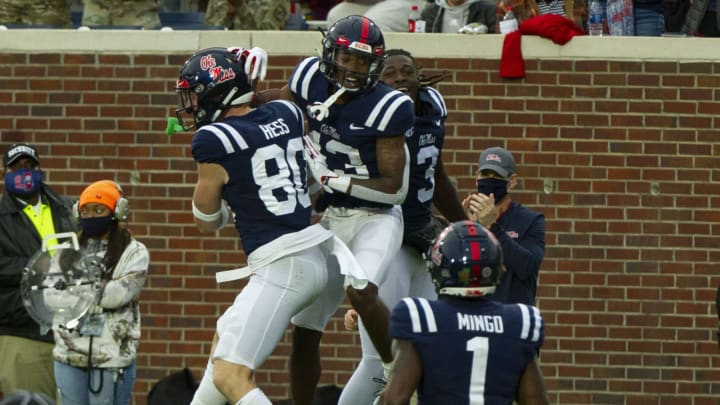 Nov 28, 2020; Oxford, Mississippi, USA; Mississippi Rebels wide receiver Braylon Sanders (13) celebrates with teammates after scoring a touchdown during the first half against the Mississippi State Bulldogs at Vaught-Hemingway Stadium. Mandatory Credit: Justin Ford-USA TODAY Sports