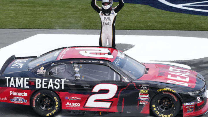 CHARLOTTE, NORTH CAROLINA - MAY 25: Tyler Reddick, driver of the #2 TAME the BEAST Chevrolet, celebrates after winning the NASCAR Xfinity Series Alsco 300 at Charlotte Motor Speedway on May 25, 2019 in Charlotte, North Carolina. (Photo by Brian Lawdermilk/Getty Images)