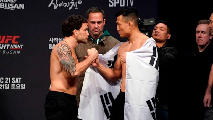 BUSAN, SOUTH KOREA - DECEMBER 20: (L-R) Frankie Edgar and Chan Sung Jung of South Korea face off during the UFC fight night weigh-in at Sajik Arena on December 20, 2019 in Busan, South Korea. (Photo by Jeff Bottari/Zuffa LLC via Getty Images)