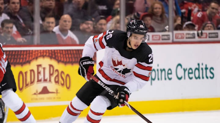VANCOUVER, BC - DECEMBER 27: Morgan Frost #26 of Canada skates with the puck in Group A hockey action of the 2019 IIHF World Junior Championship action against Switzerland on December, 27, 2018 at Rogers Arena in Vancouver, British Columbia, Canada. (Photo by Rich Lam/Getty Images)