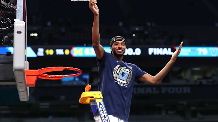 Mikal Bridges #25 of the Villanova Wildcats cuts down the net after defeating the Michigan Wolverines during the 2018 NCAA Men’s Final Four National Championships. Villanova defeated Michigan 79-62. (Photo by Tom Pennington/Getty Images)