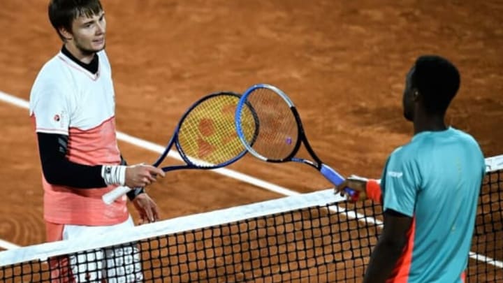 Alexander Bublik and Gael Monfils after their clash during the 2020 French Open. (Photo by Anne-Christine POUJOULAT / AFP) (Photo by ANNE-CHRISTINE POUJOULAT/AFP via Getty Images)