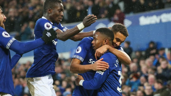 LIVERPOOL, ENGLAND - JANUARY 13: Dominic Calvert-Lewin of Everton (2R) celebrates with Ademola Lookman and team mates after scoring his team's second goal during the Premier League match between Everton FC and AFC Bournemouth at Goodison Park on January 13, 2019 in Liverpool, United Kingdom. (Photo by Alex Livesey/Getty Images)