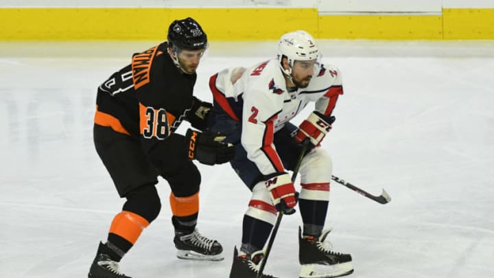 PHILADELPHIA, PA - MARCH 06: Philadelphia Flyers Winger Ryan Hartman (38) attempts to corral Washington Capitals Defenceman Matt Niskanen (2) during the game between the Washington Capitals and the Philadelphia Flyers on March 6, 2019 at Wells Fargo Center in Philadelphia, PA.(Photo by Andy Lewis/Icon Sportswire via Getty Images)