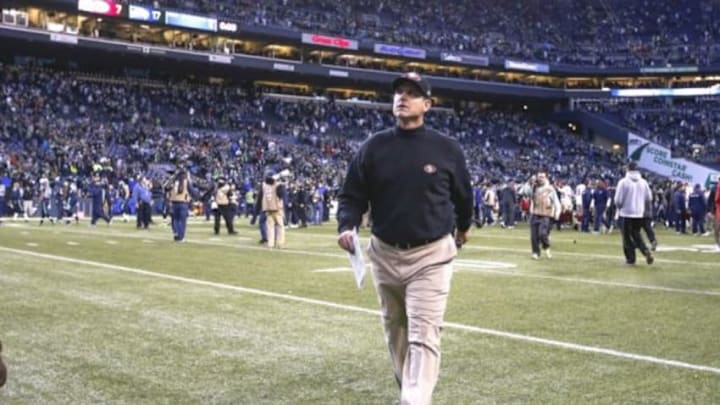 Dec 14, 2014; Seattle, WA, USA; San Francisco 49ers head coach Jim Harbaugh walks back to the locker room following a 17-7 Seattle Seahawks victory at CenturyLink Field. Mandatory Credit: Joe Nicholson-USA TODAY Sports