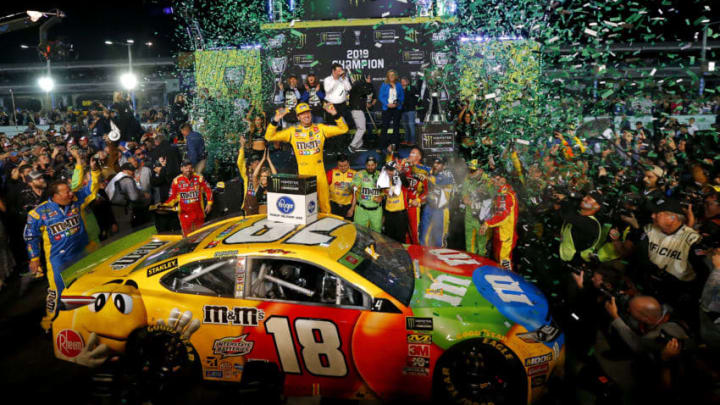 HOMESTEAD, FLORIDA - NOVEMBER 17: Kyle Busch, driver of the #18 M&M's Toyota, celebrates in Victory Lane after winning the Monster Energy NASCAR Cup Series Ford EcoBoost 400 and the Monster Energy NASCAR Cup Series Championship at Homestead Speedway on November 17, 2019 in Homestead, Florida. (Photo by Jonathan Ferrey/Getty Images)