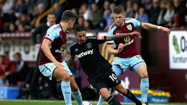BURNLEY, ENGLAND - OCTOBER 14: Manuel Lanzini of West Ham United takes on the Burnley defence during the Premier League match between Burnley and West Ham United at Turf Moor on October 14, 2017 in Burnley, England. (Photo by Nigel Roddis/Getty Images)