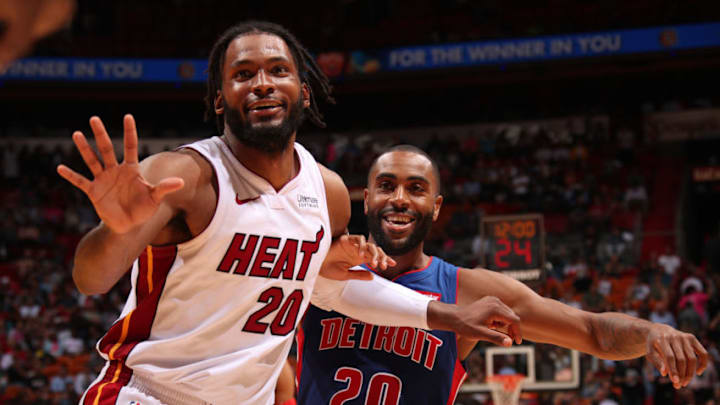 MIAMI, FL - MARCH 13: Justise Winslow #20 of the Miami Heat and Wayne Ellington #20 of the Detroit Pistons smile during a game on March 13, 2019 at American Airlines Arena in Miami, Florida. NOTE TO USER: User expressly acknowledges and agrees that, by downloading and or using this Photograph, user is consenting to the terms and conditions of the Getty Images License Agreement. Mandatory Copyright Notice: Copyright 2019 NBAE (Photo by Issac Baldizon/NBAE via Getty Images)