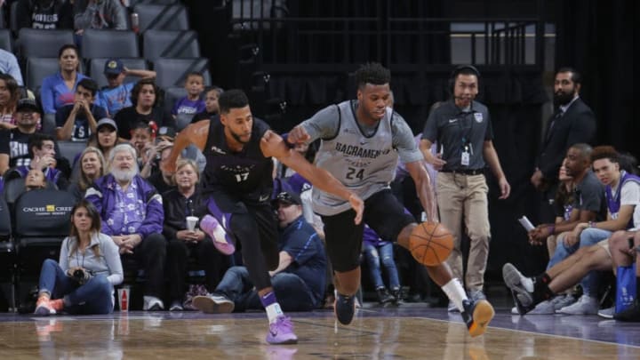 SACRAMENTO, CA - OCTOBER 15: Garrett Temple #17 and Buddy Hield #24 of the Sacramento Kings go for a loose ball at the Sacramento Kings Fan Fest on October 15, 2017 at Golden 1 Center in Sacramento, California. NOTE TO USER: User expressly acknowledges and agrees that, by downloading and/or using this Photograph, user is consenting to the terms and conditions of the Getty Images License Agreement. Mandatory Copyright Notice: Copyright 2017 NBAE (Photo by Rocky Widner/NBAE via Getty Images)