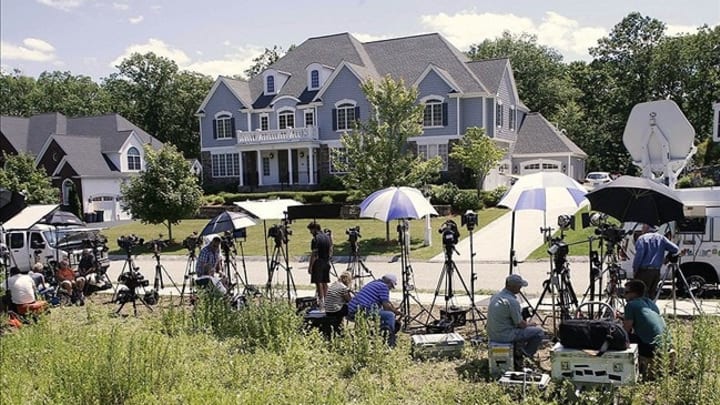 Jun 20, 2013; North Attleborough, MA, USA; Media stake out the house of New England Patriots tight end Aaron Hernandez in North Attleborough, Mass. Mandatory Credit: Winslow Townson-USA TODAY Sports
