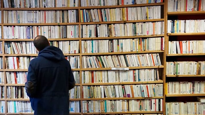 A man examines books in a bookshop on April 2, 2018 during a second-hand books fair in Becherel, western France. / AFP PHOTO / DAMIEN MEYER (Photo credit should read DAMIEN MEYER/AFP/Getty Images) A man examines books in a bookshop on April 2, 2018 during a second-hand books fair in Becherel, western France. / AFP PHOTO / DAMIEN MEYER (Photo credit should read DAMIEN MEYER/AFP/Getty Images)