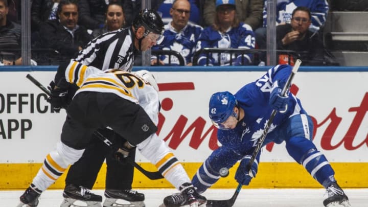 TORONTO, ON - APRIL 16: Tyler Bozak #42 of the Toronto Maple Leafs takes a face off against David Krejci #46 of the Boston Bruins in Game Three of the Eastern Conference First Round during the 2018 NHL Stanley Cup Playoffs at the Air Canada Centre on April 16, 2018 in Toronto, Ontario, Canada. (Photo by Mark Blinch/NHLI via Getty Images)