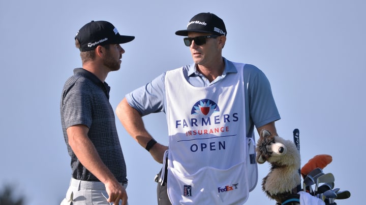 Jan 24, 2020; San Diego, California, USA; Matthew Wolff (L) talks to caddie Steve Lohmeyer talk during the second round of the Farmers Insurance Open golf tournament at Torrey Pines Municipal Golf Course – North Course. Mandatory Credit: Orlando Ramirez-USA TODAY Sports