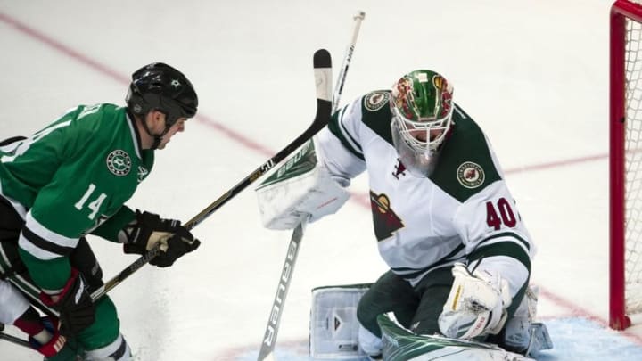 Apr 16, 2016; Dallas, TX, USA; Dallas Stars left wing Jamie Benn (14) scores the game winning goal against Minnesota Wild goalie Devan Dubnyk (40) during the third period of game two of the first round of the 2016 Stanley Cup Playoffs at the American Airlines Center. The Stars defeat the Wild 2-1. Mandatory Credit: Jerome Miron-USA TODAY Sports