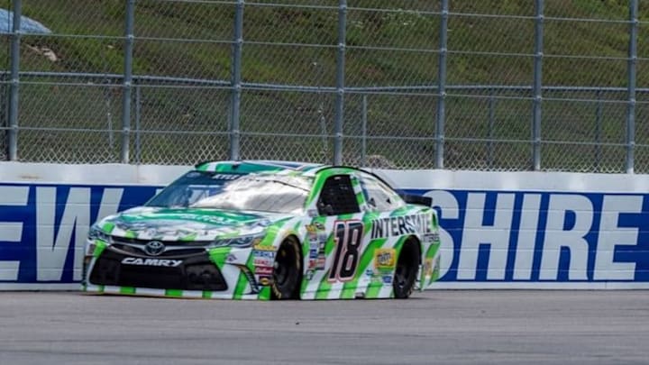 Jul 16, 2016; Loudon, NH, USA; Sprint Cup Series driver Kyle Busch (18) drives down the back stretch during practice for the New Hampshire 301 at New Hampshire Motor Speedway. Mandatory Credit: Jerome Miron-USA TODAY Sports
