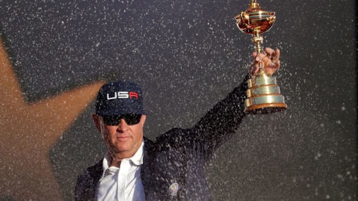 CHASKA, MN - OCTOBER 02: Captain Davis Love III of the United States celebrates during the closing ceremony of the 2016 Ryder Cup at Hazeltine National Golf Club on October 2, 2016 in Chaska, Minnesota. (Photo by Jamie Squire/Getty Images)