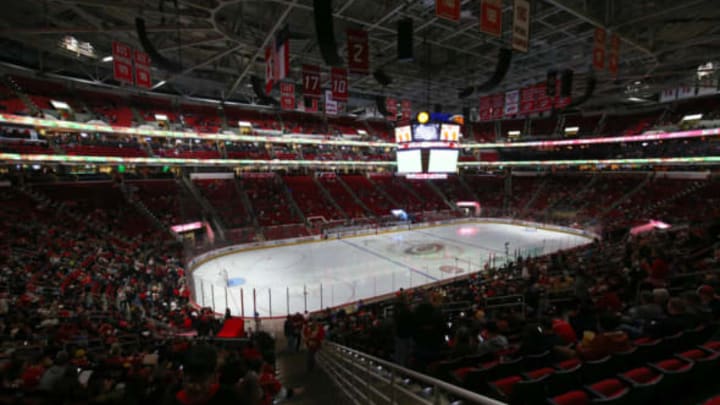 Dec 19, 2016; Raleigh, NC, USA; Carolina Hurricanes and Detroit Red Wings fans wait for the game to start because of a delay to mechanical problems with the ice at PNC Arena. Mandatory Credit: James Guillory-USA TODAY Sports