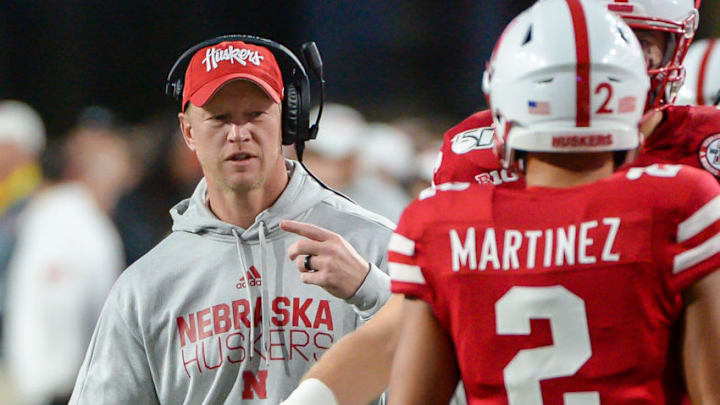 LINCOLN, NE - SEPTEMBER 28: Head coach Scott Frost of the Nebraska Cornhuskers talks with quarterback Adrian Martinez #2 during the game against the Ohio State Buckeyes at Memorial Stadium on September 28, 2019 in Lincoln, Nebraska. (Photo by Steven Branscombe/Getty Images)
