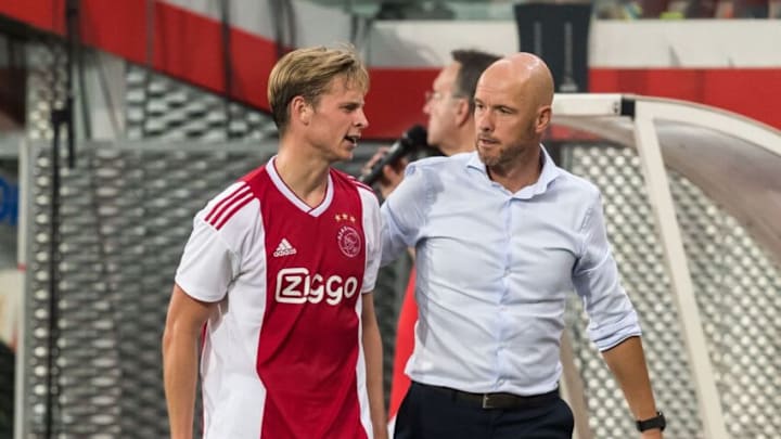 (L-R) Frenkie de Jong of Ajax, coach Erik ten Hag of Ajax during the UEFA Champions League third round qualifying first leg match between Royal Standard de Liège and Ajax Amsterdam at Stade Maurice Dufrasne on August 07, 2018 in Liege, Belgium(Photo by VI Images via Getty Images)