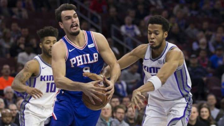 PHILADELPHIA, PA - DECEMBER 19: Dario Saric #9 of the Philadelphia 76ers drives to the basket against Skal Labissiere #7 of the Sacramento Kings in the second quarter at the Wells Fargo Center on December 19, 2017 in Philadelphia, Pennsylvania. NOTE TO USER: User expressly acknowledges and agrees that, by downloading and or using this photograph, User is consenting to the terms and conditions of the Getty Images License Agreement. (Photo by Mitchell Leff/Getty Images)