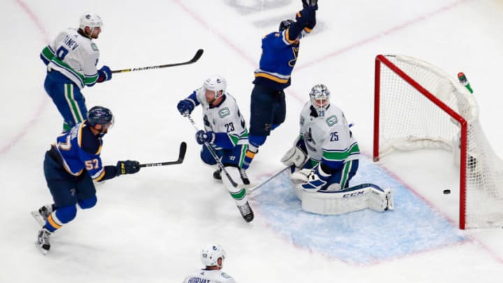 EDMONTON, ALBERTA - AUGUST 14: David Perron #57 of the St. Louis Blues scores with seven seconds left in the third period against the Jacob Markstrom #25 of the Vancouver Canucks to tie the score at 3-3 in Game Two of the Western Conference First Round during the 2020 NHL Stanley Cup Playoffs at Rogers Place on August 14, 2020 in Edmonton, Alberta, Canada. (Photo by Jeff Vinnick/Getty Images)