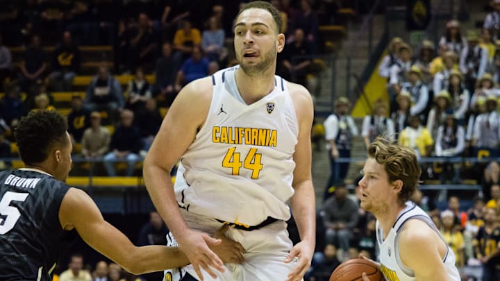 Feb 5, 2017; Berkeley, CA, USA; Colorado Buffaloes guard Deleon Brown (5) on defense as California Golden Bears center Kameron Rooks (44) tries to set a screen for guard Grant Mullins (3) during the second half at Haas Pavilion. The California Golden Bears defeated the Colorado Buffaloes 77-66. Mandatory Credit: Kelley L Cox-USA TODAY Sports