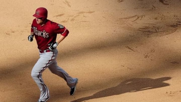 May 25, 2015; St. Louis, MO, USA; Arizona Diamondbacks right fielder Mark Trumbo (15) runs the bases after hitting a game tying two run home run off of St. Louis Cardinals relief pitcher Kevin Siegrist (not pictured) during the eighth inning at Busch Stadium. The Cardinals won 3-2 in 10 innings. Mandatory Credit: Jeff Curry-USA TODAY Sports