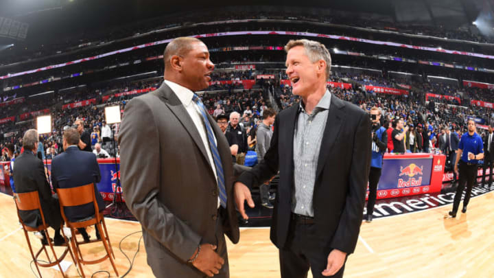 LOS ANGELES, CA - JANUARY 6: Head Coaches Doc Rivers of the LA Clippers and Steve Kerr of the Golden State Warriors talk before the game on January 6, 2018 at STAPLES Center in Los Angeles, California. NOTE TO USER: User expressly acknowledges and agrees that, by downloading and/or using this Photograph, user is consenting to the terms and conditions of the Getty Images License Agreement. Mandatory Copyright Notice: Copyright 2018 NBAE (Photo by Andrew D. Bernstein/NBAE via Getty Images)