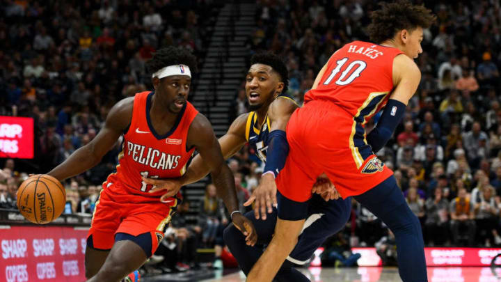 SALT LAKE CITY, UT - NOVEMBER 23: Jrue Holiday #11 of the New Orleans Pelicans drives around Donovan Mitchell #45 of the Utah Jazz during a game at Vivint Smart Home Arena on November 23, 2019 in Salt Lake City, Utah. NOTE TO USER: User expressly acknowledges and agrees that, by downloading and/or using this photograph, user is consenting to the terms and conditions of the Getty Images License Agreement. (Photo by Alex Goodlett/Getty Images)