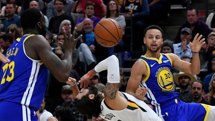 SALT LAKE CITY, UT - OCTOBER 19: Stephen Curry #30 of the Golden State Warriors is called for a foul as he passes over Ricky Rubio #3 of the Utah Jazz in the first half of a NBA game at Vivint Smart Home Arena on October 19, 2018 in Salt Lake City, Utah. NOTE TO USER: User expressly acknowledges and agrees that, by downloading and or using this photograph, User is consenting to the terms and conditions of the Getty Images License Agreement. (Photo by Gene Sweeney Jr./Getty Images)