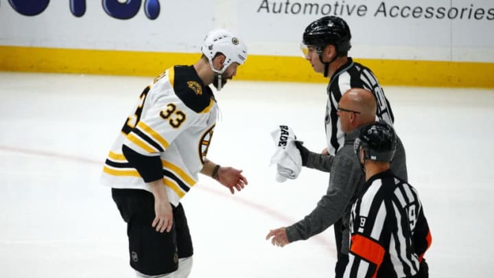 ST LOUIS, MISSOURI - JUNE 03: Zdeno Chara #33 of the Boston Bruins is attended to after being injured during the game against the St. Louis Blues in Game Four of the 2019 NHL Stanley Cup Final at Enterprise Center on June 03, 2019 in St Louis, Missouri. (Photo by Dilip Vishwanat/Getty Images)