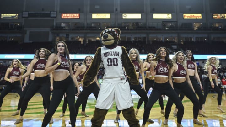 MISSOULA, MT - MARCH 10: Montana Grizzlies mascot Monte and the dance team performn against the Weber State Wildcats in the quarterfinals of the Men's Big Sky Conference Basketball Championships at Idaho Central Arena on March 10, 2022 in Boise, Idaho. Montana lost to Weber State 69-56. (Photo by Tommy Martino/University of Montana via Getty Images)