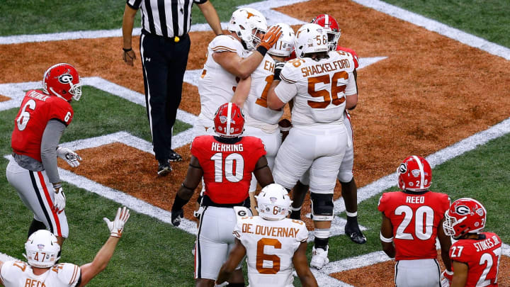 NEW ORLEANS, LOUISIANA – JANUARY 01: Sam Ehlinger #11 of the Texas Longhorns celebrates a touchdown during the first half of the Allstate Sugar Bowl against the Georgia Bulldogs at the Mercedes-Benz Superdome on January 01, 2019 in New Orleans, Louisiana. (Photo by Jonathan Bachman/Getty Images)