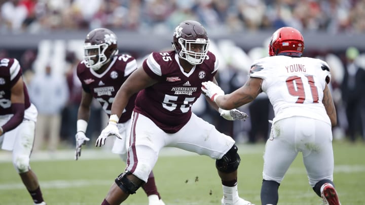 JACKSONVILLE, FL – DECEMBER 30: Martinas Rankin #55 of the Mississippi State Bulldogs blocks against the Louisville Cardinals during the TaxSlayer Bowl at EverBank Field on December 30, 2017 in Jacksonville, Florida. The Bulldogs won 31-27. (Photo by Joe Robbins/Getty Images)