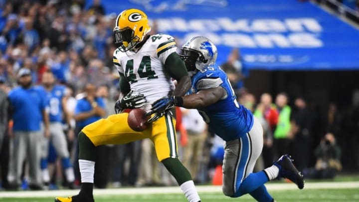 Dec 3, 2015; Detroit, MI, USA; Green Bay Packers running back James Starks (44) is unable to complete a pass while being pressured by Detroit Lions middle linebacker Stephen Tulloch (55) during the fourth quarter at Ford Field. Green Bay won 27-23. Mandatory Credit: Tim Fuller-USA TODAY Sports
