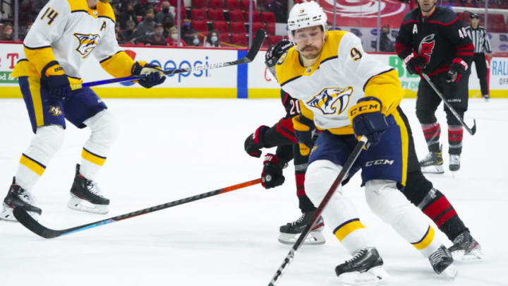 May 17, 2021; Raleigh, North Carolina, USA; Nashville Predators left wing Filip Forsberg (9) skates with the puck against the Carolina Hurricanes in game one of the first round of the 2021 Stanley Cup Playoffs at PNC Arena. Mandatory Credit: James Guillory-USA TODAY Sports