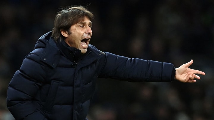 Tottenham Hotspur's Italian head coach Antonio Conte gestures during the second leg of the English League Cup semi final football match between Tottenham Hotspur and Chelsea at the Tottenham Hotspur Stadium, in London on January 12, 2022. - (Photo by GLYN KIRK/IKIMAGES/AFP via Getty Images)