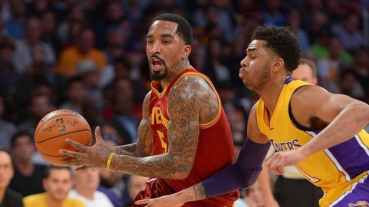 Mar 10, 2016; Los Angeles, CA, USA; Los Angeles Lakers guard D'Angelo Russell (1) guards Cleveland Cavaliers guard J.R. Smith (5) in the first half of the game at Staples Center. Mandatory Credit: Jayne Kamin-Oncea-USA TODAY Sports